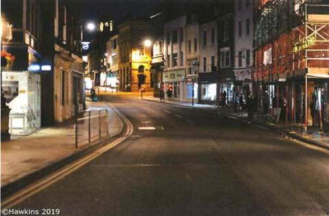 A street with buildings on either side

Description automatically generated with medium confidence